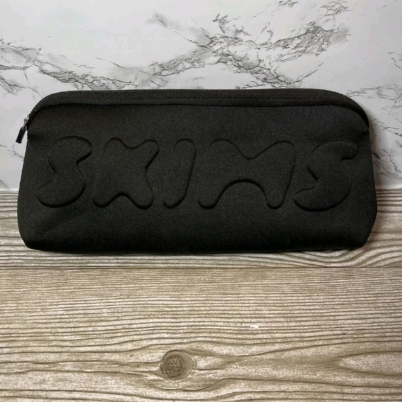SKIMS Handbags - NWT SKIMS Neoprene Black LongPouch Bag Clutch for Shapewear Makeup Lingerie NWT